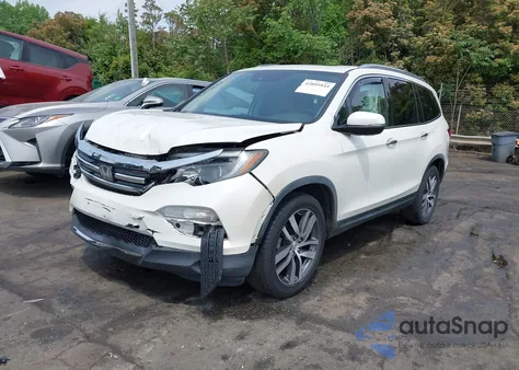 2017 Honda Pilot Touring from USA, damaged, VIN 5FNYF5H91HB033359